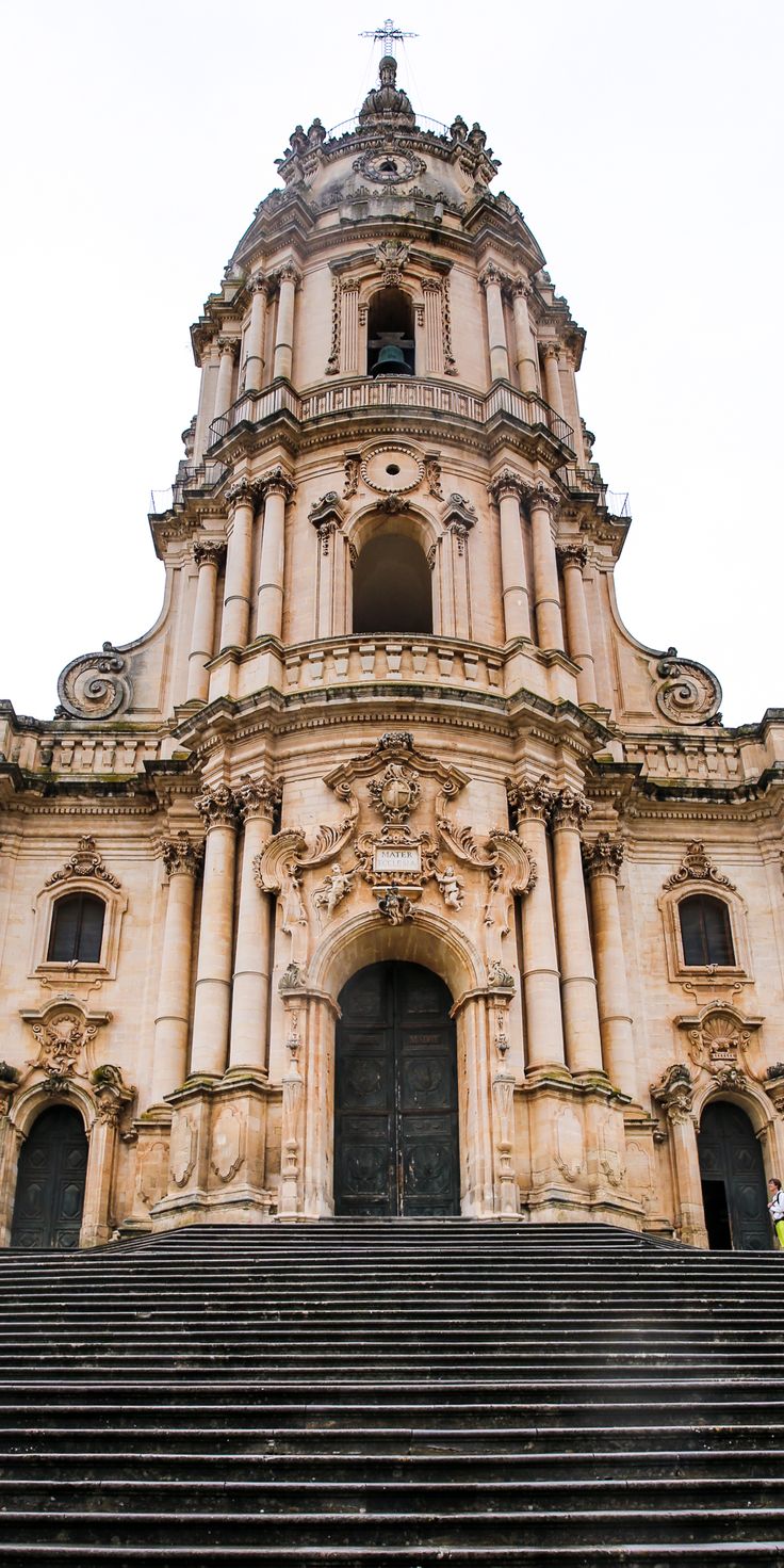 an old building with steps leading up to it