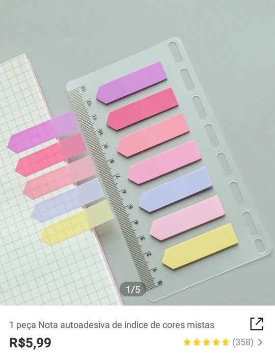 several pieces of paper with colored adhesives on them