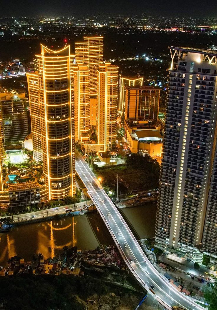 an aerial view of a city at night