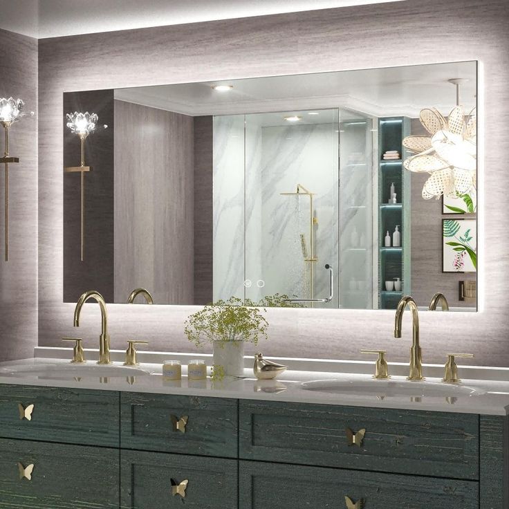 a bathroom with two sinks and a large mirror