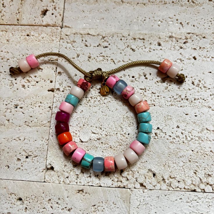 These bracelets and necklaces are a collection based around a rainbow of gemstone pony beads. Paired with the Mini Seeds in photo. Add-on stones can be purchases additionally here, please specify if you want your add on strung on your bracelet in the personalization comments. If left blank it will be sent separately: https://www.etsy.com/listing/946252171/bracelet-add-ons?ref=shop_home_active_4 All of my cords are one size fits all. Stones are subject to availability and may be substituted when necessary. Precious gems are formed in different ways and composed of different materials, meaning their appearances vary vastly. Gems may be treated to enrich color. Recommended to be stacked with many! Beaded with love ❤️. Rainbow Natural Stones Beaded Bracelets For Jewelry Making, Colorful Hand-strung Friendship Jewelry, Bohemian Rainbow Gemstone Beaded Bracelets, Bohemian Rainbow Beaded Bracelet With Gemstone Beads, Rainbow Hand-strung Jewelry For Friendship, Multicolor Bohemian Friendship Bracelets With Gemstone Beads, Bohemian Rainbow Beaded Bracelets With Natural Stones, Multicolor Natural Stones Friendship Bracelets As Gift, Multicolor Natural Stones Friendship Bracelets