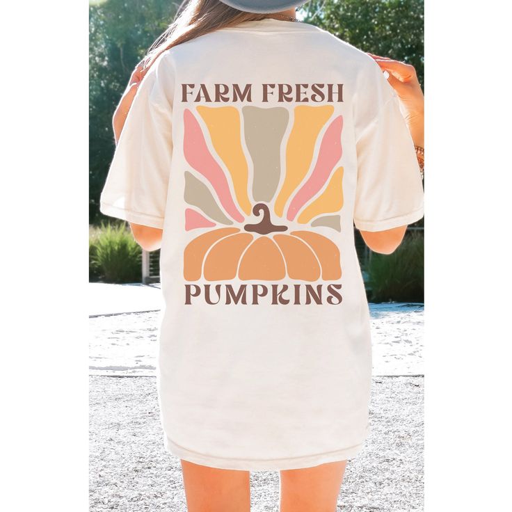 Get into the festive spirit this season with our adorable retro pumpkin shirt! Perfect for celebrating Thanksgiving or enjoying a cozy fall day, this cute fall shirt features a vibrant design that showcases the charm of pumpkin season. Whether you're heading to a pumpkin patch or hosting a Halloween party, our retro Halloween tee is a delightful choice. It's not just a shirt; it's a fun way to show off your love for autumn and all its festivities. This retro pumpkin shirt also makes a fantastic Trendy Fall Short Sleeve Shirt, Trendy Short Sleeve Fall Shirt, Fun Fall Top With Letter Print, Retro Graphic Print Tops For Fall, Cute White Tops For Fall, Fun Letter Print Top For Fall, Fun Letter Print Tops For Fall, Fall Cotton Shirt In Orange, Orange Cotton Shirt For Fall