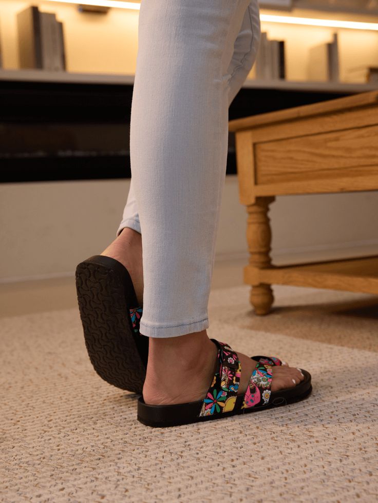 Step into comfort and style with Maibulun Thong Toe Cushioned Footbed Sandals. Designed with a cushioned footbed and thong toe, these sandals provide the perfect blend of support and style. The multi tropical prints adds a pop of color to any outfit, making these sandals a versatile addition to your wardrobe. 0.59" inch heel Slip-on / buckle closure Soft Cushioned footbed Man-made leather upper Man-made lining PU sole Comfortable Toe Loop Footbed Sandals For The Beach, Comfortable Synthetic Toe Loop Footbed Sandals, Summer Toe Loop Flip Flops With Cushioned Footbed, Comfortable Flat Flip Flops With Textured Footbed, Casual Synthetic Toe Loop Footbed Sandals, Casual Slides With Textured Footbed And Toe Loop, Comfortable Textured Flat Flip Flops, Comfortable Toe Loop Footbed Sandals For Summer, Comfortable Synthetic Toe Post Footbed Sandals