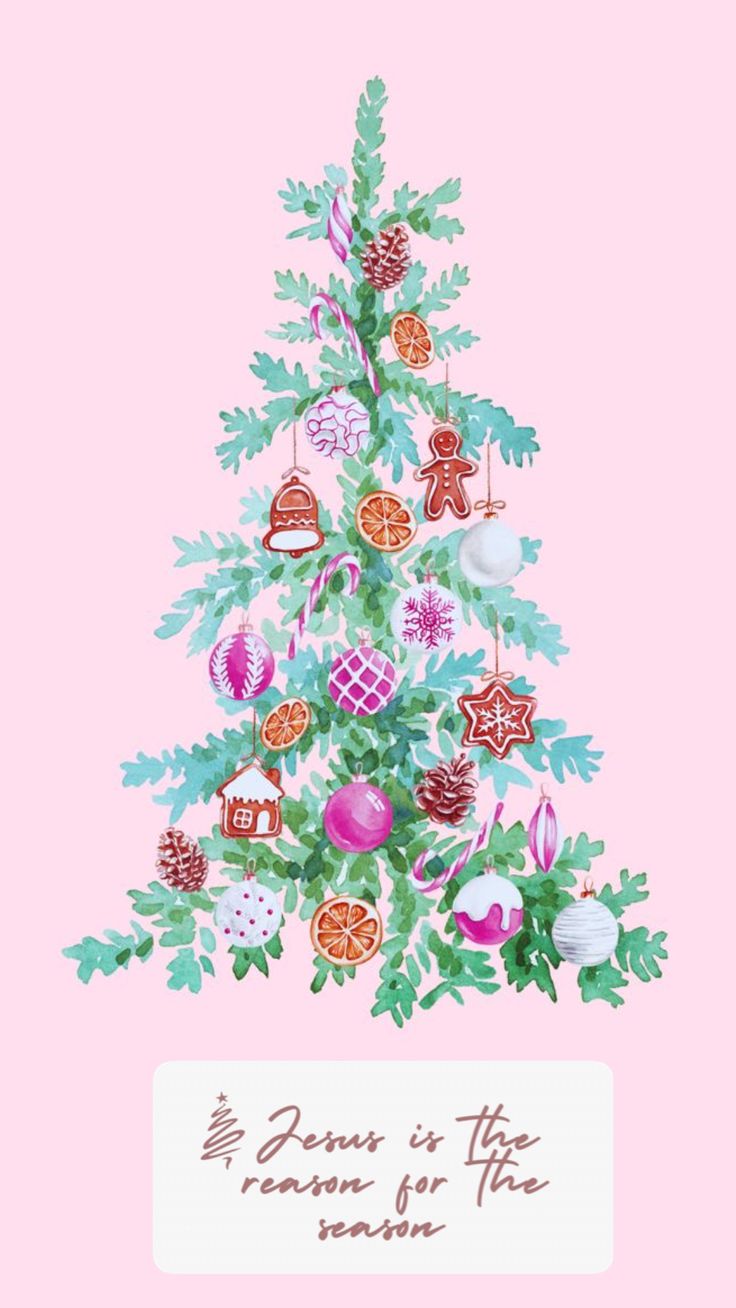 a pink christmas tree with ornaments on it