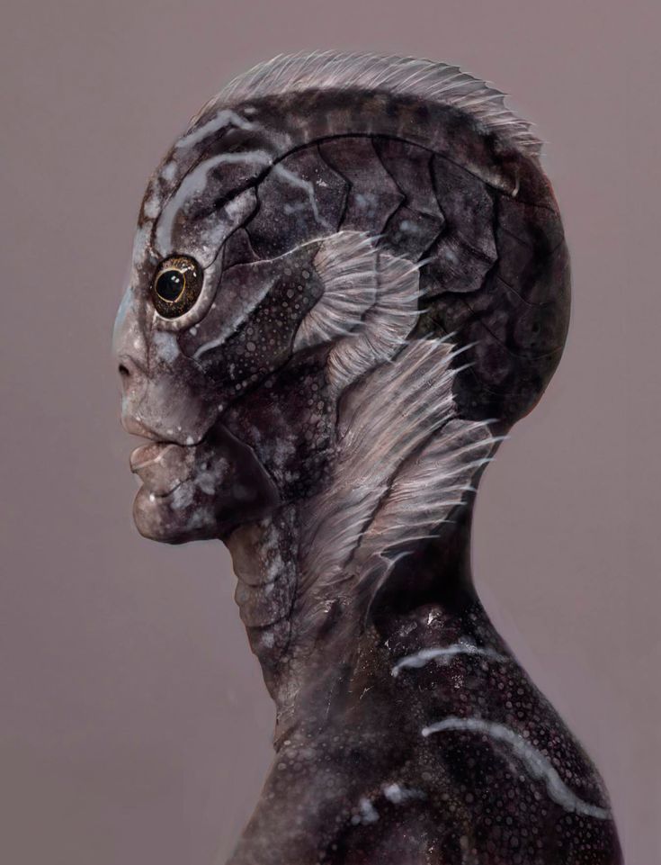 a close up of a statue of an alien