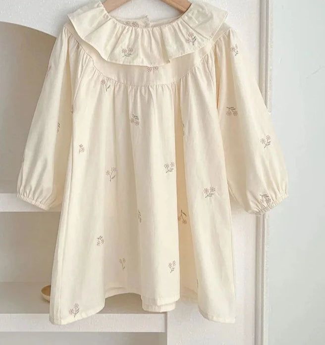 Long Sleeve Flower Embroidered Dress Material: Cotton True to size, please take your normal size. Cotton Fall Dress With Embroidered Hem, Fall Cotton Dress With Embroidered Hem, Cotton Dress With Embroidered Hem For Fall, Long Sleeve Beige Dress With Embroidered Hem, Cotton Floral Embroidered Dress For Spring, Spring Cotton Floral Embroidery Dress, Cotton Floral Embroidery Dress For Spring, White Floral Embroidered Dresses For Fall, Cute Long Sleeve Spring Dress