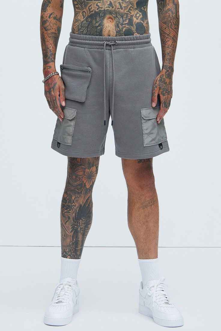 Available In Charcoal and Black Elastic Waistband Drawstring Side Hand Pockets Back Hand Pocket Cargo Pockets 60% Cotton 40% Polyester Contrast: 100% Polyester Imported | Mens Tyson Everything We Need Sweat Shorts in Charcoal size 3XL by Fashion Nova Gray Cargo Shorts With Pockets For Outdoor, Gray Cargo Shorts With Pockets For Outdoor Activities, Gray Cargo Pocket Shorts For Streetwear, Gray Streetwear Shorts With Side Pockets, Cotton Cargo Pocket Athleisure Shorts, Gray Sportswear Shorts For Streetwear, Cotton Athleisure Shorts With Cargo Pockets, Cotton Cargo Shorts In Athleisure Style, Utility Sports Shorts With Side Pockets