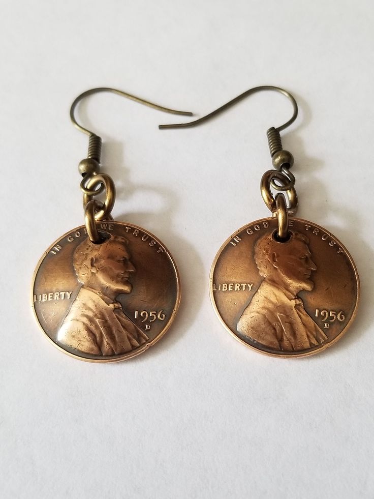 "Celebrate 65 years in 2021 with earrings made with genuine 1956 US pennies. A fun and unique way to  say \"Happy 65th to those born in 1956. I buff them to bring out the design on the dark antique patina I domed and polish each penny and link them to ear wires. I apply a clear metal coating to the pennies to maintain the color and  shine. You can choose any year you want." Penny Jewelry, 65th Birthday Gift, Custom Coins, 65th Birthday, Mexican Jewelry, Coin Earrings, Coin Jewelry, Jewelry Unique, To The