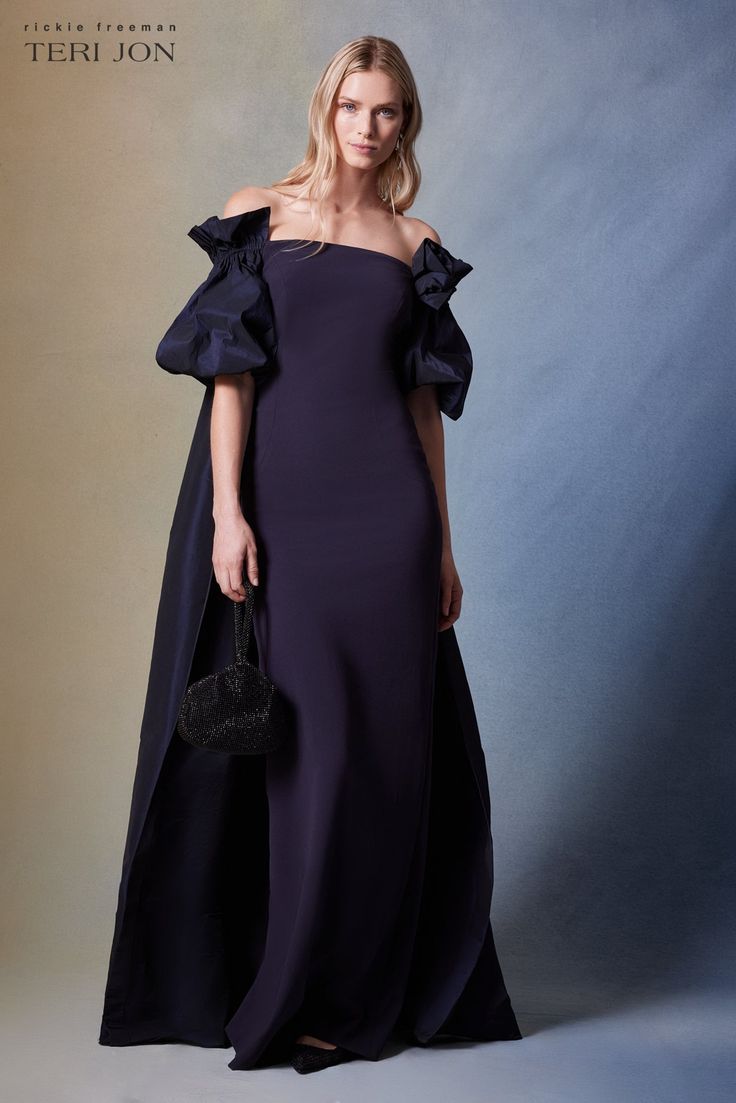 Step into timeless elegance with our exquisitely crafted crepe and taffeta evening gown, designed to captivate with every sway. Featuring luxurious stretch crepe fabric that skims your curves beautifully. Featuring unique puff sleeves that take this dress to another level, as well as the show stopping taffeta cape that cascades elegantly down your back. Whether you're attending a gala, black tie wedding, or special event, this gown will make you feel like the belle of the ball. Color: Black Crep Evening Gown With Cape, Gown With Cape, Gown Inspiration, Black Tie Wedding, Stretch Crepe, Style Mistakes, Gorgeous Gowns, Crepe Fabric, Dress Ideas