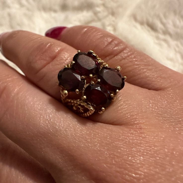 Beautiful Real Garnet Ring In 10k Gold. This Is Vintage , It Has Nice Details On The Side Of The Ring.. Formal Multi-stone Garnet Rings, Formal Yellow Gold Garnet Jewelry, Formal Garnet Gemstone Cluster Ring, Formal Round Garnet Cluster Ring, Heirloom Ruby Ring With Open Design For Formal Occasions, Luxury Garnet Wedding Jewelry, Heirloom Ruby Open Ring For Formal Occasions, Garnet Multi-stone Anniversary Rings, Multi-stone Garnet Rings For Anniversary