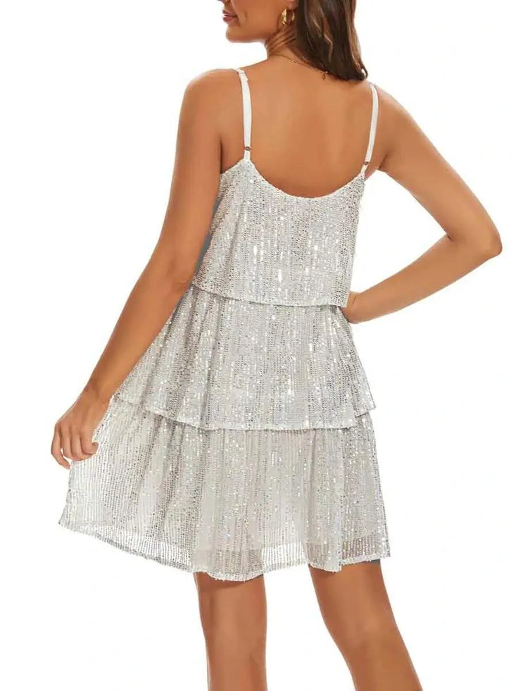 Features of the White Sequin Slip Dress 💖Unique White Sequin DesignThe dress's eye-catching white sequin design emits a dazzling white light, injecting a touch of dazzling fashion into your outfit.💖Sexy V-neck and Backless DesignFeaturing a sexy V-neck design that gracefully highlights the neckline and complemented by a charming backless design, the white sequin suspender dress accentuates the alluring curves of women, presenting a bold and fashionable style.💖Comfortable Silky FeelCrafted fro White Glamorous V-neck Sequin Dress, Prom Sequin Fabric, Sparkling For Summer, Summer Prom Sequin Fabric With Sparkling Details, Sparkling Sequin Fabric For Summer Prom, Summer Sequin Fabric For Prom, Elegant Sequin Fabric For Summer Night Out, Glamorous Sparkling Sequin Fabric For Summer, Glamorous Sparkling Summer Sequin Fabric, Glamorous White Sequin V-neck Dress