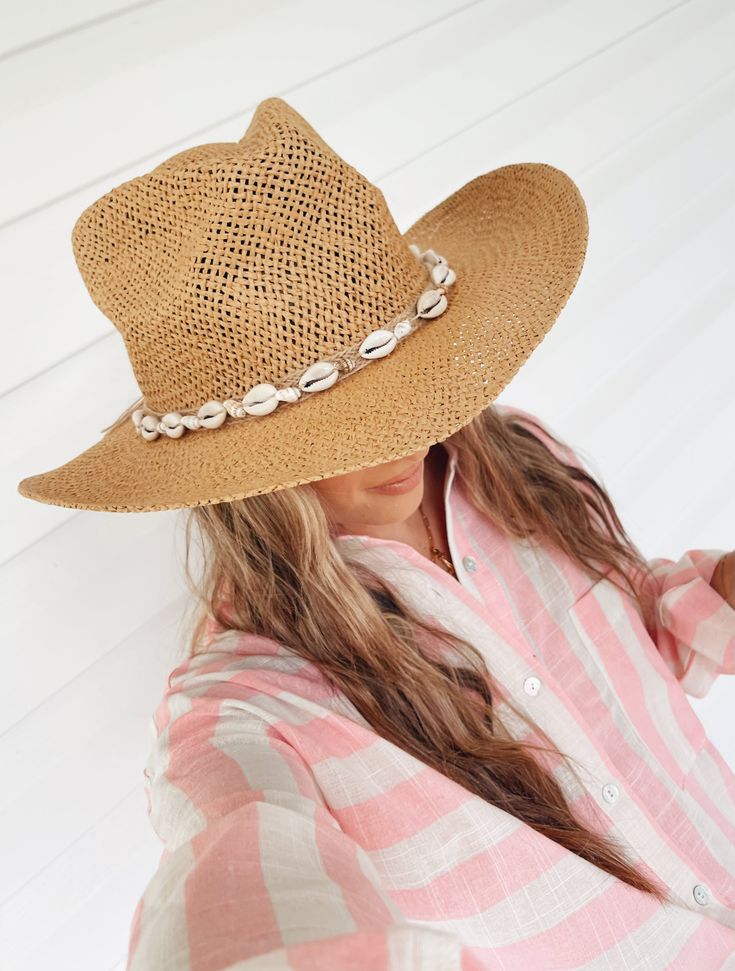 Product Details: Effortlessly elevate your beach style with the Coastal Cowgirl Straw Hat. This lightweight and adjustable hat is made from high-quality straw material, perfect for providing shade on a sunny day. Plus, the seashell detailing adds a touch of coastal charm. Stay fashion-forward and protected from the sun with this must-have accessory! Summer Coastal Straw Hat, Coastal Summer Straw Hat, Coastal Style Summer Straw Hat, Straw Coastal Sun Hat For Summer, Coastal Straw Sun Hat For Summer, Lightweight Coastal Straw Hat For Summer, Lightweight Straw Hat For Beach Vacation, Lightweight Beachwear Straw Hat For Vacation, Lightweight Beachwear Sun Hat For Beach Season