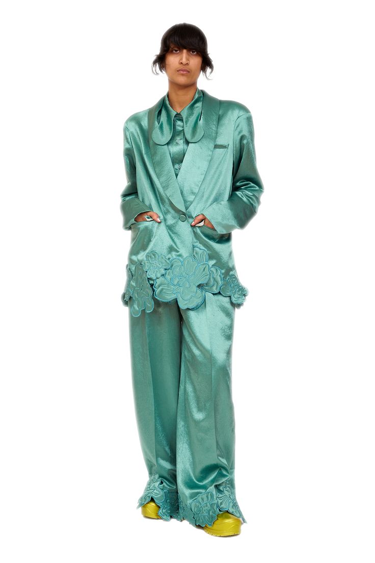 Boxy blazer with embroidered flower appliqués at the them. Slightly sloped shoulders, double breasted with single button. Fully lined. Complete the suit with the Ribbit Pant and Bunny Button Up. 100% Eco Certified Acetate, lining 100% Polyester Model wears size Small Made in New York