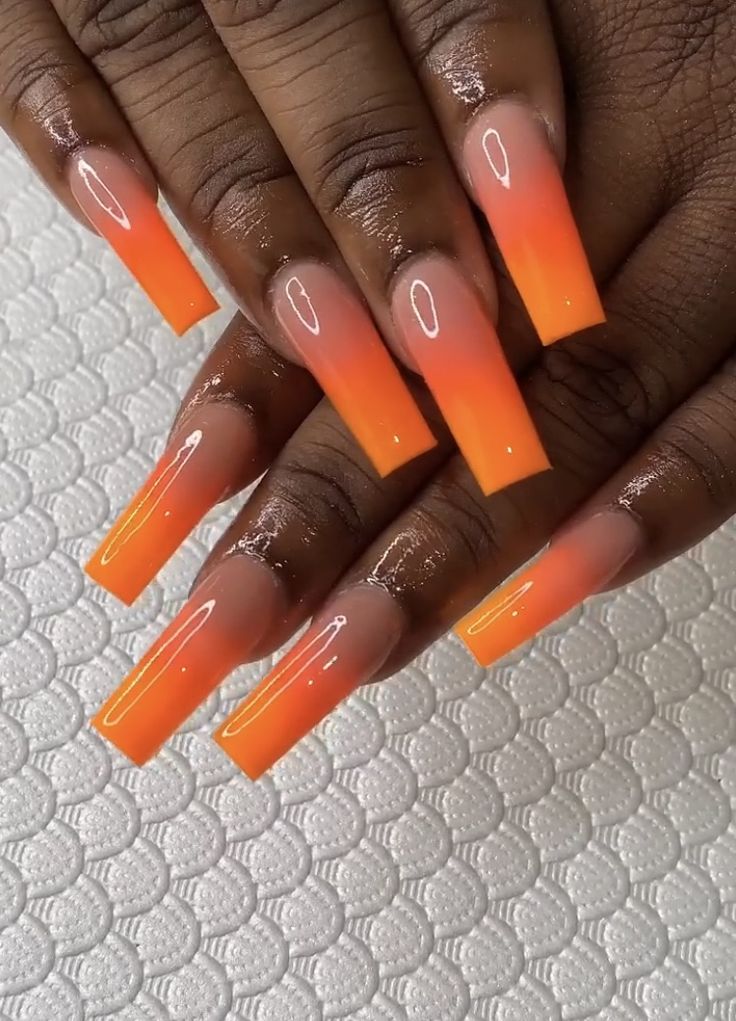 Neon Nails Acrylic Coffin Long, Bright Orange Ombre Nails, Rappers Nails, Orange Tapered Square Nails, Bright Ombré Nails, Orange Ombre Acrylic Nails, Orange Square Acrylic Nails, Bright Summer Acrylic Nails Square, Bright Ombre Nails Summer