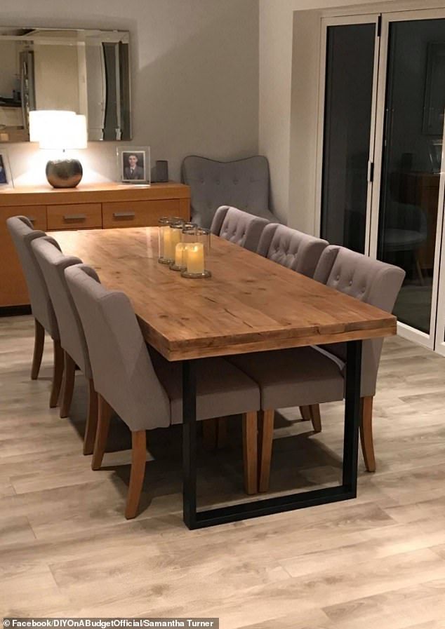 a dining room table with chairs and candles on it