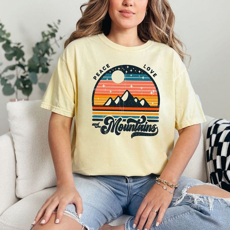 Looking for a cute versatile top to wear? Make sure to grab one of our Graphic tees! This soft and comfortable graphic tee is the perfect top for any outfit. It can be paired with biker shorts, jeans, or even a simple skirt/dress! This tee is true-to-size, so be sure to order your regular t-shirt size! If you are looking for a more oversized look, make sure to size up! Tie Dye Graphic Tee With Graphic Print, Tie Dye Graphic Print Crew Neck Top, Eco-friendly Graphic Tee With Short Sleeves, Retro Tie-dye Crew Neck Top, Short Palm Trees, Groovy Short Sleeve T-shirt With Retro Print, Grunge Shorts, Cheap Groovy Graphic T-shirt, Yellow Soft-washed Graphic Tee