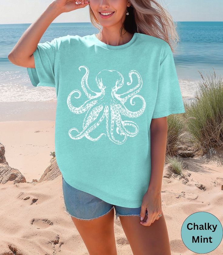 This Gender-Neutral Adult T-shirts item is sold by CoastalComfortWear. Ships from San Jose, CA. Listed on Apr 21, 2024 Fun Beach T-shirt With Sublimation Print, Fun Green T-shirt For The Beach, Casual Blue T-shirt For Beach Party, Beach T-shirt With Sublimation Print, Casual Pre-shrunk T-shirt For Beach, Beach Season Shirt With Sublimation Print, Beach Shirt With Sublimation Print, Casual Ocean Color Beach Tops, Casual Ocean Color Tops For Beach