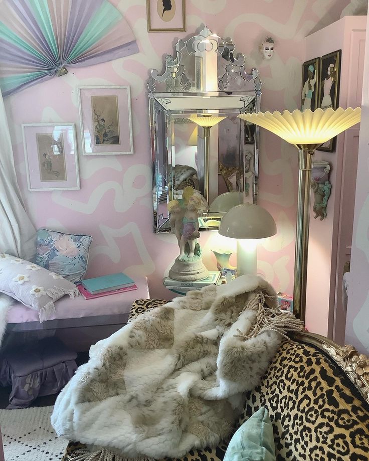 a bedroom with pink walls and animal print furniture