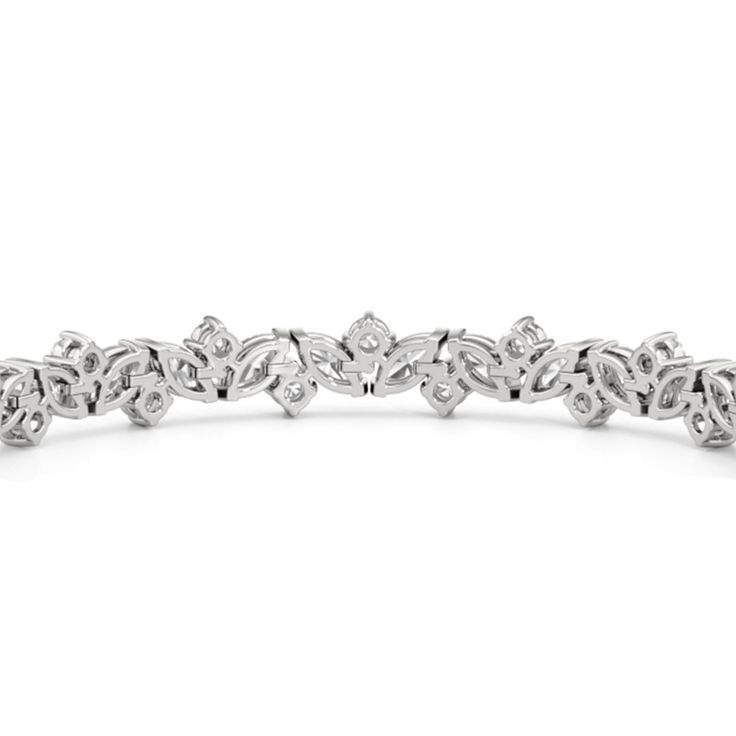 An absolute showstopper, this diamond tennis bracelet will have all eyes on your wrist. It features marquise diamonds and round diamonds arranged in a fanciful pattern to create a row of diamonds with gently undulating arches. This tennis bracelet is lovely on its own, but lovelier when worn with bangles and dainty chains. Luxury Marquise Tennis Bracelet For Women, Luxury Diamond Marquise Bracelets, Luxury Marquise Diamond Bracelets, Marquise Tennis Bracelet For Wedding, Fine Jewelry, Luxury Marquise Diamond Bracelet, Infinity Pendant, Diamond Tennis Bracelet, Tennis Bracelet Diamond, Fancy Color Diamonds