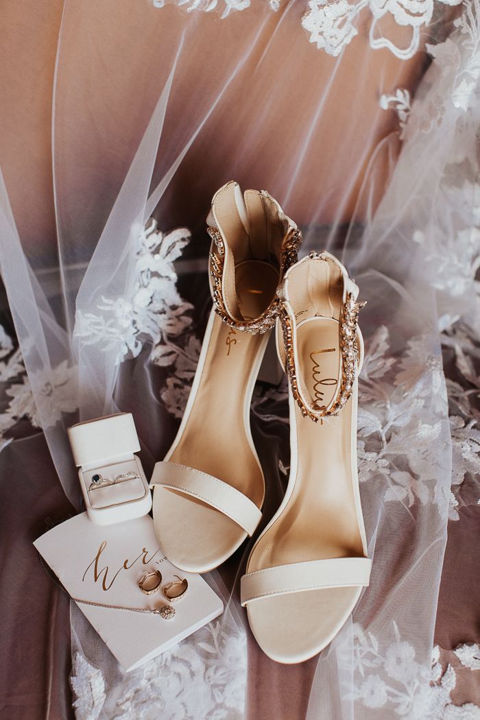 the bride's shoes and jewelry are on display