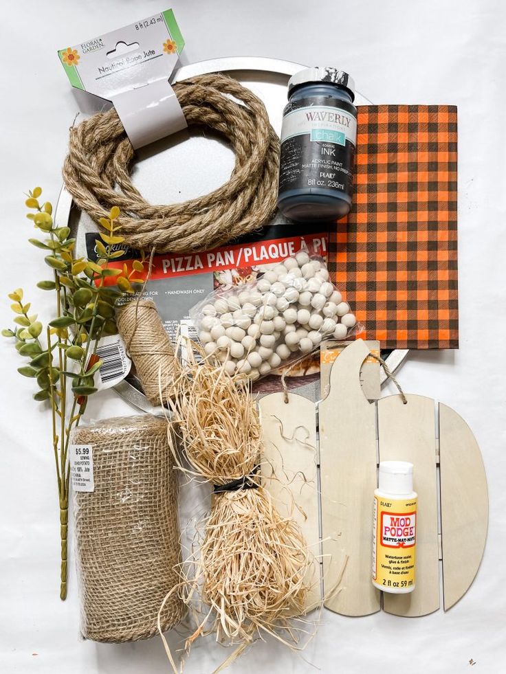 an assortment of crafting supplies laid out on a white surface with text overlay