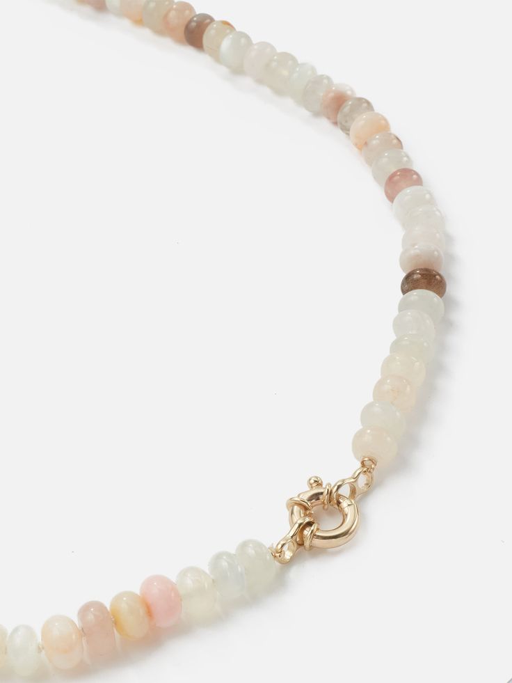 The Encirkled Cashmere Ombre Gemstone Necklace is perfect for everyday and includes a 14k yellow gold spring ring clasp that is perfect for holding your favorite charms. Assorted 8mm gemstones that may include agate, aventurine, chocolate moonstone, peach moonstone, Peruvian opal, rainbow moonstone, rutilated quartz, rose quartz, selenite, and strawberry quartz Gemstone card comes with each necklace with list of included gemstones 12mm 14k yellow gold spring ring clasp Each piece is unique and m Everyday Rondelle Gemstone Necklaces, Everyday Gemstone Beaded Necklaces, Everyday Rondelle Gemstone Beads Necklace, Everyday Round Gemstone Beads Jewelry, Adjustable Pink Opal Gemstone Jewelry, Elegant Pink Opal Round Necklace, Everyday Necklaces With Natural Round Beads, Everyday Natural Stones Round Beads Necklace, Rondelle Agate Jewelry With Natural Stones