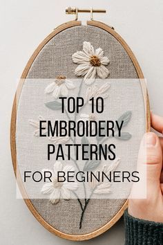 someone is holding up a cross stitch pattern with the words top 10 embroidery patterns for beginners