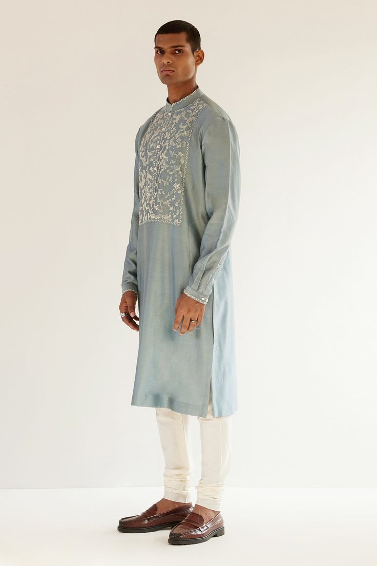 Powder blue chanderi kurta with an embroidered yoke. Comes with churidar.
Component: 2
Pattern: Embroidery
Type Of Work: Abstract
Neckline: Mandarin
Sleeve Type: Long sleeves
Fabric: Chanderi
Color: Blue
Other Details: 
Abstract embroidery
Occasion: Mehendi and Puja - Aza Fashions Embroidery Abstract, Abstract Embroidery, Pattern Embroidery, Fashion App, Churidar, Blue Abstract, Powder Blue, Aza Fashion, Sleeve Type