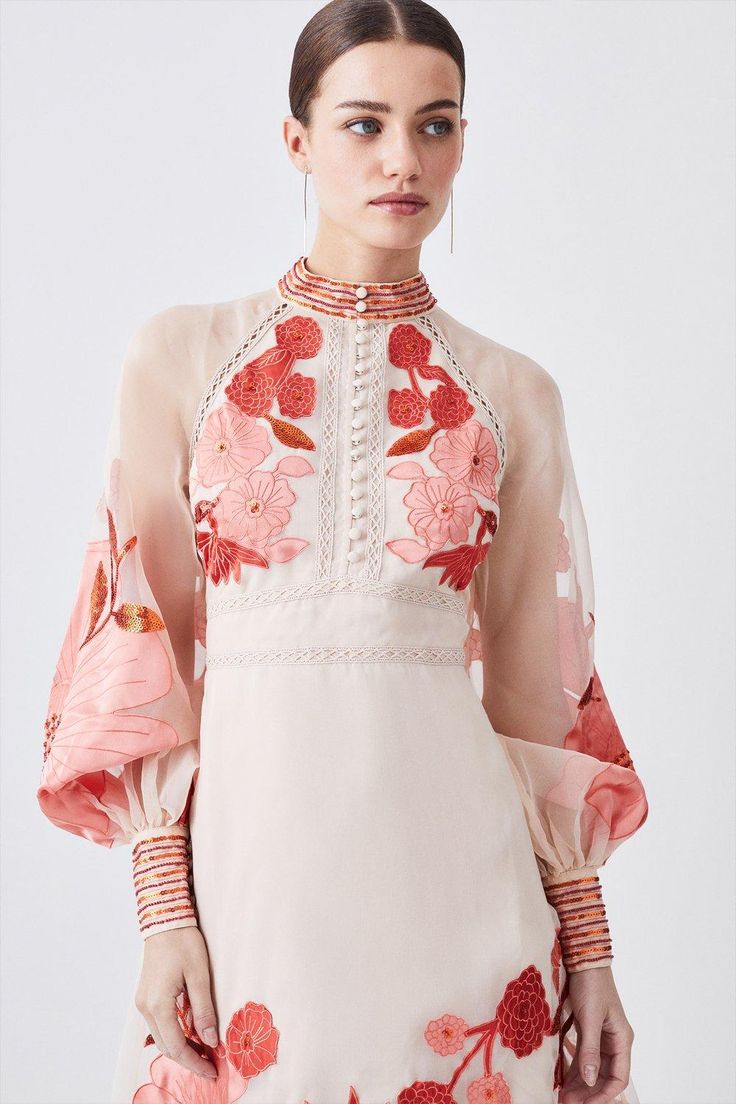 {@@=Ist.Core.Helpers.StringHelper.ToProperCase("Crafted with vibrant floral applique motifs, this refined organdie dress exudes understated elegance. Intricate sequin embellishments around the neckline and cuffs add a glamorous touch, while sheer balloon sleeves add an ethereal element.Floral applique detailsBalloon sleevesMidi hemlineSequin embellishmentsExpertly designed for those 5'3" and under, our Petite pieces are perfectly proportioned for a smaller frame using shorter lengths.")} Organdie Dress, Navy Crafts, Notes Craft, Navy Midi Dress, Understated Elegance, Floral Applique, Small Frame, Karen Millen, Balloon Sleeves