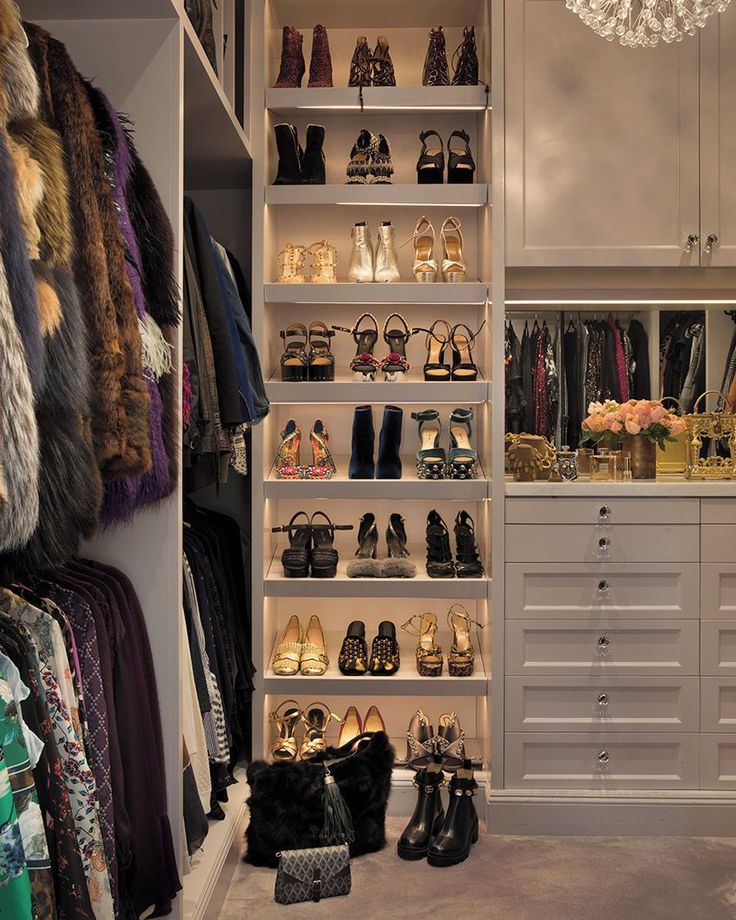 the closet is full of shoes and handbags