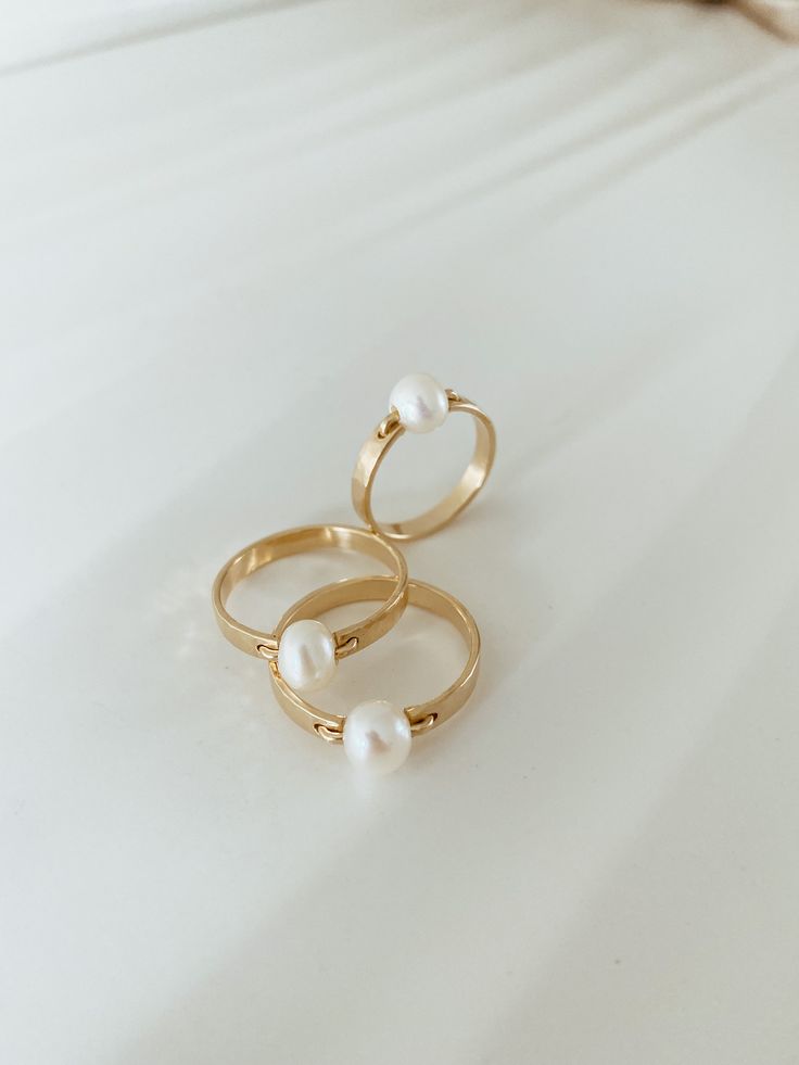 Our bold pearl ring is a gorgeous freshwater pearl statement ring on a lightly hammered band. Just the right size to make a statement but minimal enough for everyday. You will reach for this ring all the time. Handmade in 14k gold fill to withstand daily wear time after time. Time After Time, Jewelry Aesthetic, Hammered Band, Stacked Jewelry, Dainty Ring, Pearl Size, Pearl Ring, Statement Ring, Fresh Water