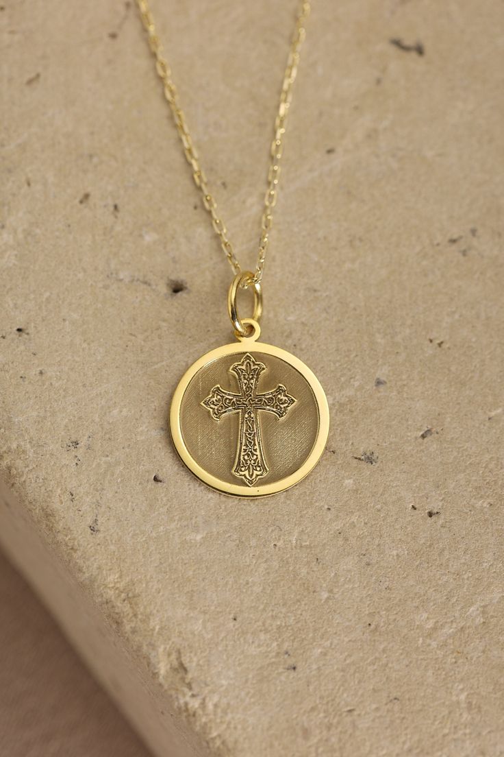 Gold Cross Pendant - Cross Gold Necklace ● Material of pendant: Solid Gold 14k ( REAL GOLD ) ● Metal Stamp: 14k ( REAL GOLD ) ● The pendant is available in 5 sizes: - 12,7 mm / 0.5 inches (Diameter) - 14,0 mm / 0,55 inches ( Diameter ) In the photos - 15,3 mm / 0.6 inches ( Diameter ) - 16,5 mm / 0,65 inches ( Diameter ) - 19,1 mm / 0,75 inches ( Diameter ) ( In the photos the size is 14mm / 0.55 inches Diameter ) ( Jump Ring inner diameter: 4 mm ) ● Material of chain: Solid gold 14k ( REAL GOLD 14k Gold Spiritual Cross Pendant Necklace, Spiritual 14k Gold Cross Pendant Necklace, Gold Crucifix Jewelry Stamped 14k, Gold Crucifix Necklace In 14k Gold, Spiritual Cross Necklace In Yellow Gold, Spiritual Yellow Gold Cross Necklaces, Gold Sterling Silver Charm Necklace With Cross Pendant, Gold 14k Cross Pendant Charm Necklace, Gold Cross Charm Necklace Tarnish Resistant