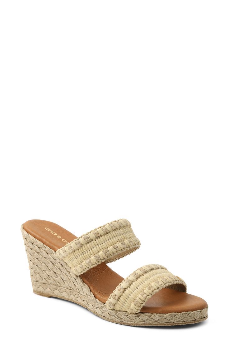 A raffia-covered wedge and straps keep your look vacation ready in a lofty sandal finished with the brand's signature leather-lined footed. Style Name:André Assous Nolita Raffia Wedge Slide Sandal (Women). Style Number: 6181988. Available in stores. Natural Wedge Sandals With Woven Sole For Summer, Chic Open Toe Wedge Sandals For Vacation, Natural Espadrille Wedge Sandals For The Beach, Wedge Sandals With Heel Strap For Vacation, Beach Straw Wedge Sandals With Cork-bed Midsoles, Closed Toe Wedge Sandals With Cushioned Footbed For Vacation, Natural Wedge Sandals For Summer Beach Season, Natural Color Wedge Heel Sandals With Heel Strap, Natural Straw Closed Toe Wedge Sandals