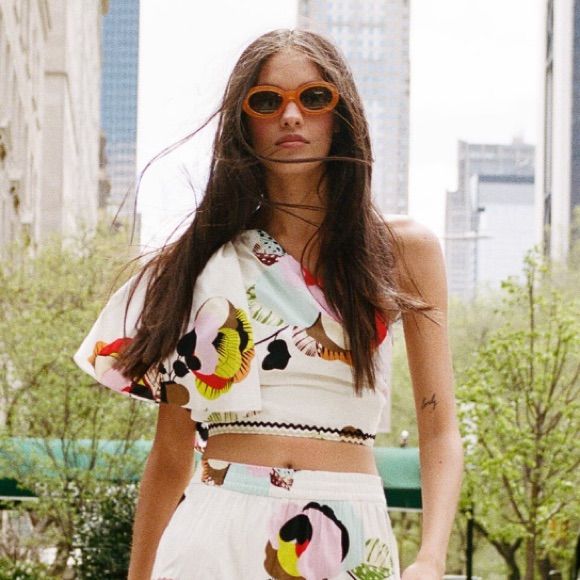 One Shoulder, Multicolored Cropped Blouse. Never Been Worn, Nwt. Chic Multicolor One-shoulder Top, Chic One-shoulder Multicolor Top, Casual White One-shoulder Crop Top, Casual White One-shoulder Blouse, White Floral Print Crop Top For Spring, Trendy White Cropped Blouse, White Floral Print Cropped Crop Top, White Floral Print Crop Top, Summer One-shoulder Crop Top For Day Out