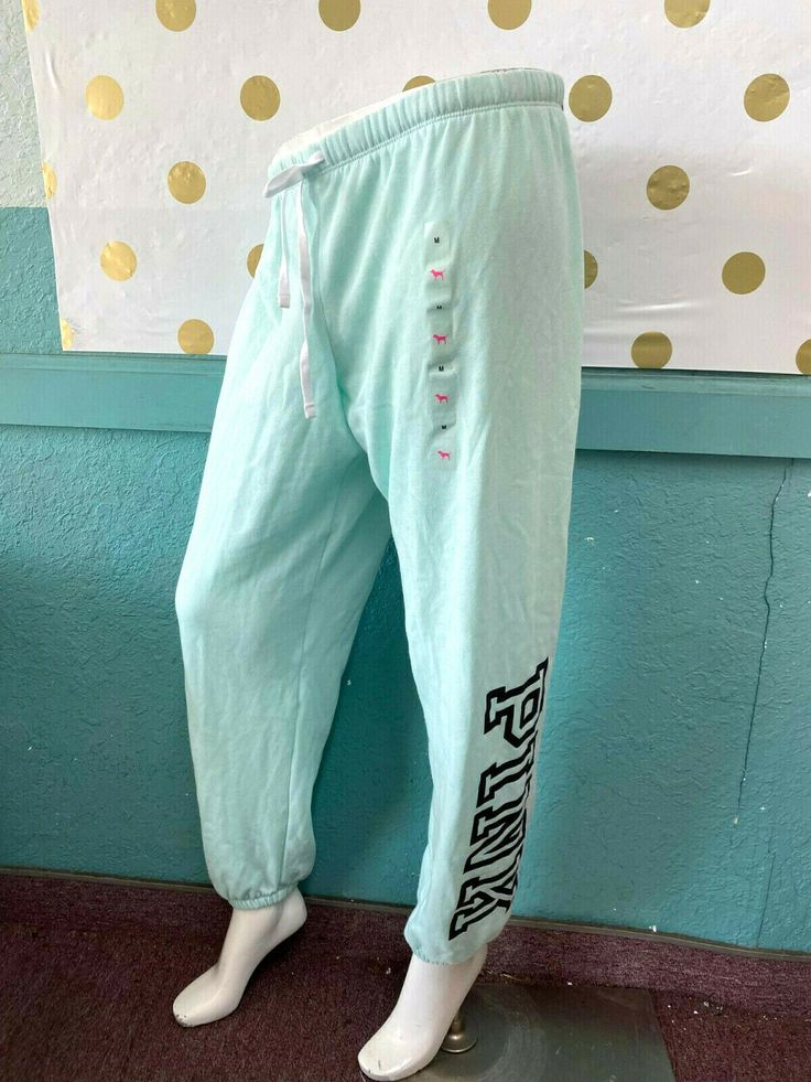 Victoria's Secret Pink Logo Classic Pant Sweatpants Mint Green New with tag Drawstring Waistband PINK by Victoria's Secret Classic Pant Logo print on one side Cinch Ankle Sweatpant Cozy Material SORRY, WE DO NOT SHIP INTERNATIONAL !!! Payment must be made within 3 days after Auction end Thank you Shipping Information US Shipping only : Shipping will be made by USPS First Class or Priority Mail, whichever is aprropriate according to the weight for inside of United States. Insurance: Optional at b Trendy Cotton Lounge Pants, Victoria's Secret Casual Cotton Pants, Spring Loungewear Pants By Victoria's Secret, Victoria's Secret Loungewear Pants For Spring, Victoria's Secret Spring Loungewear Pants, Sporty Loungewear Bottoms From Victoria's Secret, Victoria's Secret Stretch Pants For Loungewear, Victoria's Secret Stretch Loungewear Pants, Victoria's Secret Pink Casual Pants