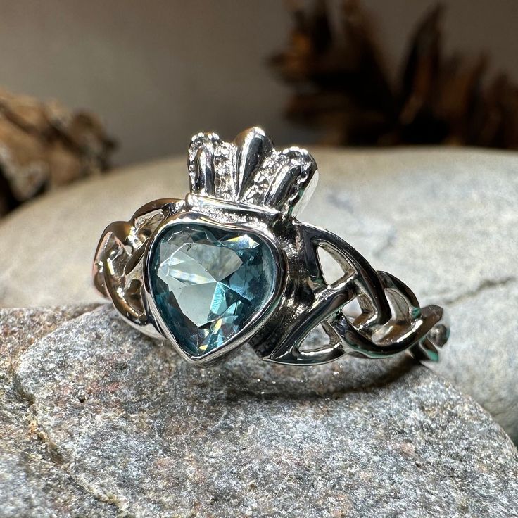 Solid Sterling Silver Irish Claddagh Ring with faceted cubic zirconia gemstone. A unique design combining the traditional elements of the Claddagh with Celtic knot work - solid sterling silver. This beautiful claddagh ring features trinity knots on the side of the heart and crown with a faceted cubic zirconia stone at the center! Choose from sizes 5-11 Hallmarked 925. 3.15 grams. The origins of the symbol came from a humble Galway fishing village but it is now one of the most recognizable symbol Claddagh Meaning, Irish Promise Rings, Celtic Knot Jewelry, Knot Jewelry, Irish Ring Claddagh, Celtic Ring, Irish Claddagh, Tree Of Life Jewelry, Claddagh Ring