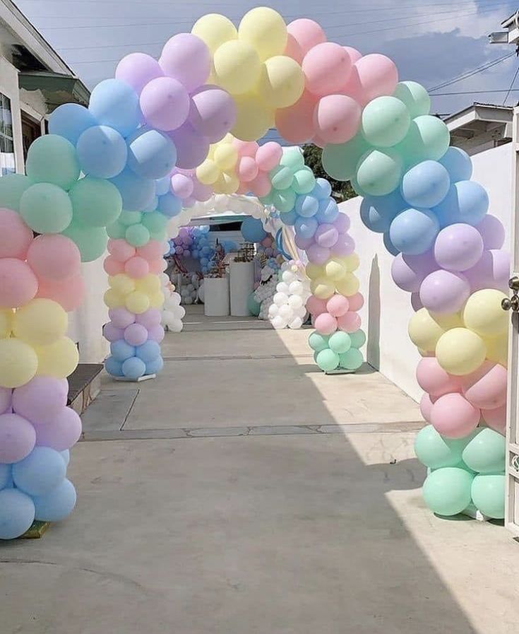 a bunch of balloons that are on the ground