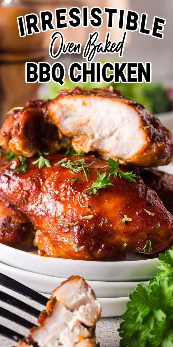 two pieces of bbq chicken on a white plate with parsley garnish