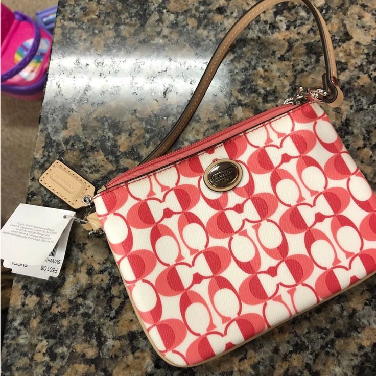 Adorable Coach Wristlet Retails For $58.00 White Pouch Wristlet With Zipper Closure, White Clutch Wristlet With Zipper Closure, Chic White Wristlet With Zipper Closure, White Clutch With Zipper Closure For Gift, White Wristlet For Daily Use, White Zipper Pouch Wristlet, White Wristlet With Zipper Closure, Red Trendy Wristlet For Everyday Use, Trendy Red Wristlet For Everyday Use