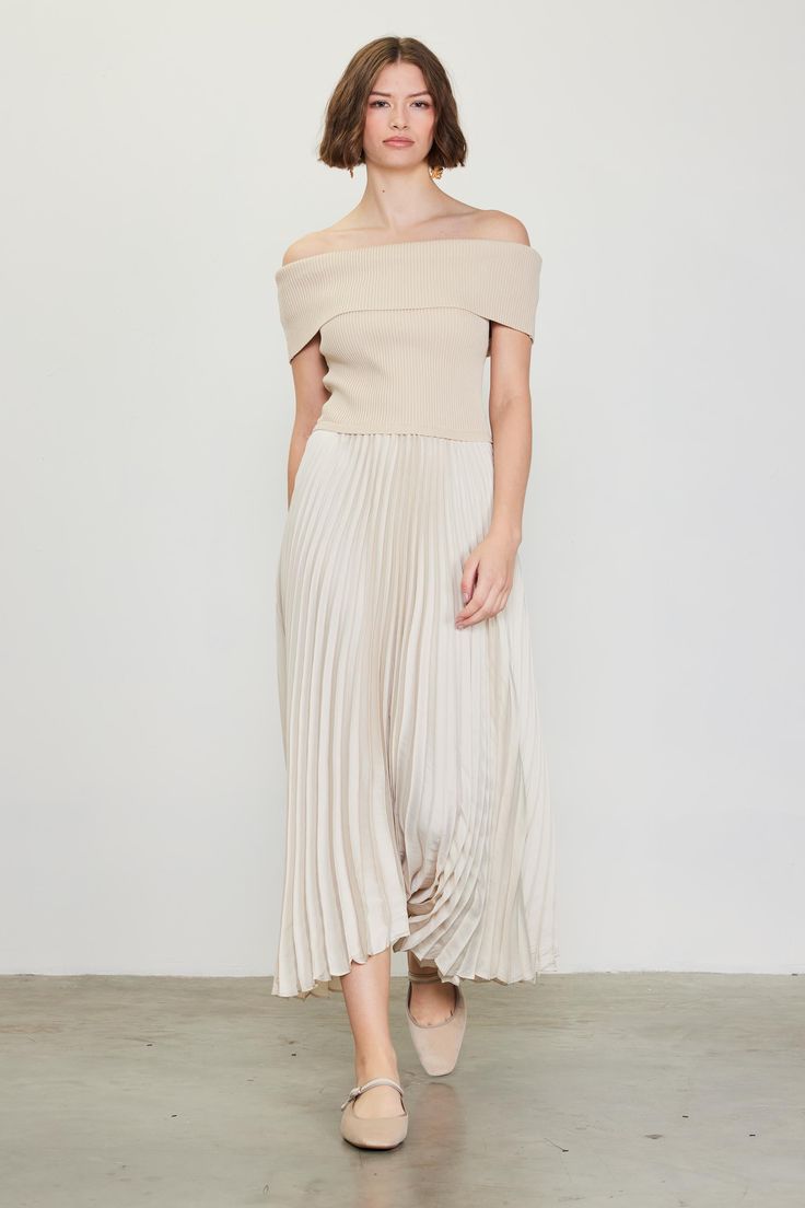 This off-shoulder dress combines a ribbed knit bodice and an airy woven skirt, creating a tonal contrast of textures. Flowing pleats cascade to a long, shin-grazing length.  •Off-shoulder silhouette  •Ribbed knit bodice  •Pleated woven skirt  •Lined skirt  •Straight hem  Item Number: 99920  70% VISCOSE 30%POLYESTER Spring Strapless Dress With Pleated Skirt, Off-shoulder Pleated Maxi Dress For Formal Occasions, Spring One-shoulder Ribbed Dress, One-shoulder Ribbed Spring Dress, Chic Off-shoulder Pleated Maxi Dress, Beige Pleated Dress With Flowy Skirt, Spring Evening Midi Dress, Ribbed, Spring Off-shoulder Ribbed Dress, Spring Evening Ribbed Midi Dress