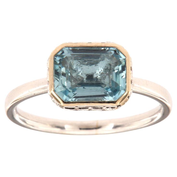 This 14k White gold delicate ring features a 1.70 Carat Blue Aquamarine emerald cut bezel set East-West style. Sixteen (16)Brilliant round diamonds are micro-prong set in a hidden halo on the crown to create the sparkle look every woman is looking to have. The diamond weight is 0.23 Carat, The band is 2 mm wide, and the ring size is 6.5 and resizable per request. Engagement Wishes, Hidden Halo, Aquamarine Rings, Halo Diamond Ring, Aquamarine Blue, Delicate Rings, Blue Gemstones, Halo Diamond, Emerald Cut