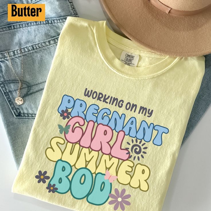 Working on My Pregnant Girl Summer Body T shirt Beach Pregnancy announcement Comfort Colors Summer Pregnancy Announcement Shirt This is a rough textured, dyed t-shirt that gives a vintage look while still remaining super soft.  ❤ SIZING  This style is UNISEX with a relaxed fit. Please, make sure to check our sizing charts included in product pictures, and compare measurements with one of your own sweaters before purchasing. For an OVERSIZED look, pick at least 2 sizes larger than your usual size.   ❤ ABOUT our t-shirts + Crew neck + Relaxed fit + Designed with love in Canada, printed and shipped from the US ❤ CARE INSTRUCTIONS To maintain the longevity of the colors on your design, wash with like colors, in cold water, on gentle cycle. Do not iron. Tumble dry on low or air dry. Do not use Summer Pregnancy Announcement, Beach Pregnancy Announcement, Pregnant Girl, Baby Shower Outfit, Beach Maternity, Summer Pregnancy, Pregnancy Announcement Shirt, Pregnancy Tshirts, Pregnancy Outfits