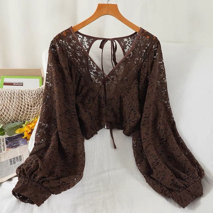 Loose, bat long sleeve lace top, short cut backless shirt top,cheap on saleMaterial:laceColor:white,black,brownStyle:sexyFeatures:bat long sleeveSize(CM):free 1inch=2.54cmlength:39,shoulder :29,bust:100,sleeve:62&ltp&gtAll items will arrive in 20-25 business days, if you have an emergency, please contact us to upgrade logistics.</p>&ltbr/>&ltp&gtNeed to add 16 dollars fast shipping(Arrive in 10-14 days).</p>&ltbr/> Brown Lace Outfit, Long Sleeve Crop Top With Lace Trim For Party, Long Sleeve Lace Trim Crop Top For Party, Brown Long Sleeve Party Tops, Brown Long Sleeve Blouse For Party, Brown Long Sleeve Party Blouse, Brown Lace Tops For Spring, Brown Long Sleeve Crop Top For Summer, Fitted Brown Lace Top