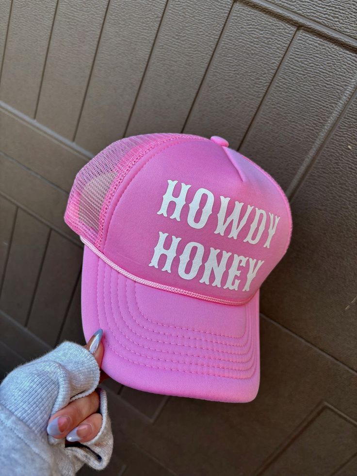 This pink foam and mesh trucker hat features a bold white font graphic, making it the perfect accessory for those who want to add a pop of color to their outfit. The foam and mesh construction ensures comfort and breathability, making it suitable for all-day wear. Upgrade your hat game with the Howdy Honey Pink Trucker Hat. White Mesh Trucker Hat For Spring, White Mesh Snapback Hat For Spring, Casual Pink Mesh Baseball Cap, Trendy White Mesh Baseball Cap, Pink Mesh Baseball Cap For Summer, Pink Mesh Baseball Cap, Trendy Mesh Baseball Cap, One Size Fits Most, Casual Pink Mesh Trucker Hat, Trendy Mesh Baseball Cap