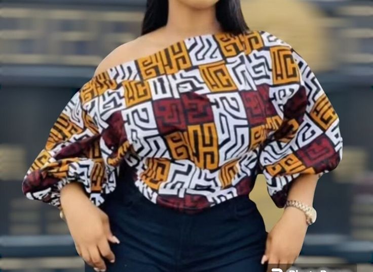 This is made from African print fabric, comfortable to wear. You can dress up or dress down with this fashionable blouse. the fabrics are 100% cotton. Its available in different fabrics. Kindly check the size measurements before making your order.  If you have any questions, concern or you have your specific measurements.  kindly send a message. We are happy to help. You looking gorgeous is our business. NOTE. THE PRIMARY COLOR IS OUT OF STOCK Thank you so much for stopping by, hope you find something nice to order from us. Cheers Patterned Blouse With Bold Print, Trendy Stretch Printed Blouse, Trendy Patterned Blouse With Bold Print, Trendy Bold Print Patterned Blouse, Trendy Bold Print Blouse For Fall, Trendy Blouse With Bold Print For Fall, Chic Blouse With Bold Print, Trendy White Blouse With Abstract Print, White Tops With Unique Print