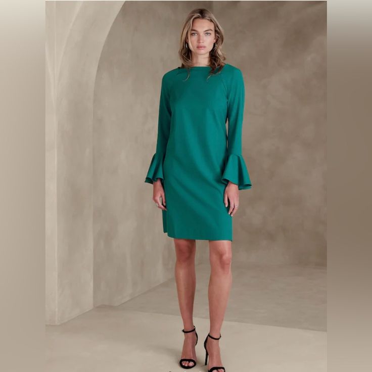 Nwt Banana Republic Ruffle-Sleeve Mini Dress Straight Neckline. Long Sleeves. Center Back Seam. Straight Hem. Made Exclusively For Banana Republic Factory. Color: Green Escape Semi Fitted. Hits Mid-Thigh. Body Length From Shoulder: Regular 35.5" Model Is 5'10" (178 Cm) And Is Wearing A Size S Or Numeric Size 4. 93% Polyester, 7% Spandex. Machine Wash. Imported. Elegant Bell Sleeve Dresses For Fall, Elegant Green Dress With Ruffle Sleeves, Ruffle Sleeve Dresses For Workwear, Fall Ruffle Sleeve Dress For Brunch, Elegant Fall Dress With Ruffle Sleeves, Green Ruffle Sleeve Dress For Brunch, Chic Ruffle Sleeve Dress For Fall, Chic Green Dress With Ruffle Sleeves, Fitted Dresses With Pleated Flutter Sleeves