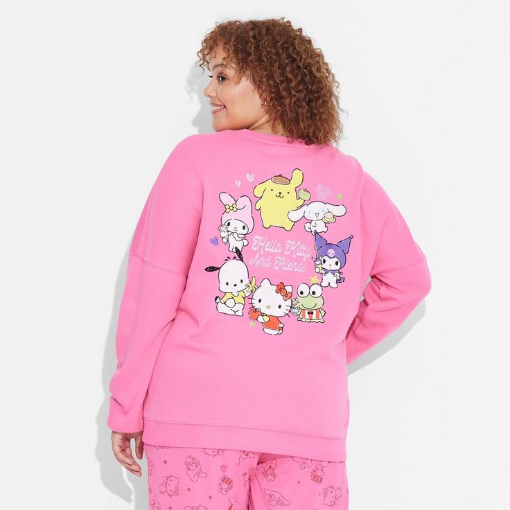 Keep your laid-back look cozy and comfortable with this Women's Hello Kitty and Friends Cozy Graphic Sweatshirt in Pink. Fashioned in a regular fit, this long-sleeve sweatshirt features a classic crewneck and a pullover style for easy wear. The soft fleece material offers cozy comfort, while the ribbed hem and cuffs provide a snugger fit. Slip on this sweatshirt with your favorite pair of jeans for a perfectly relaxed look. Hello Kitty And Friends, Pink Sweatshirt, Comforters Cozy, Easy Wear, Long Sleeve Sweatshirts, Pullover Styling, Snug Fit, Hello Kitty, Graphic Sweatshirt