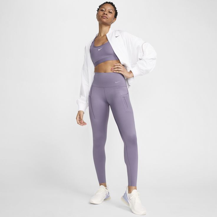 Push yourself forward with the right balance of support and comfort with our Nike Go leggings. Squat-proof—even during your toughest workouts—their sleek, midweight InfinaLock fabric feels compressive and supportive in all the right places. Multiple pockets let you carry everything you could need, whether you're hitting the trail, the gym or the mat. Functional Athletic Fit Tights For Training, Athletic Fit Training Tights, Nike Yoga Pants For Sports, Nike Sweat-resistant Athleisure Activewear, Nike Sweat Resistant Sportswear, Nike Compression Moisture-wicking Activewear, Nike Compression Activewear With Moisture-wicking, Nike Functional Compression Activewear, Nike Moisture-wicking Tights For Training