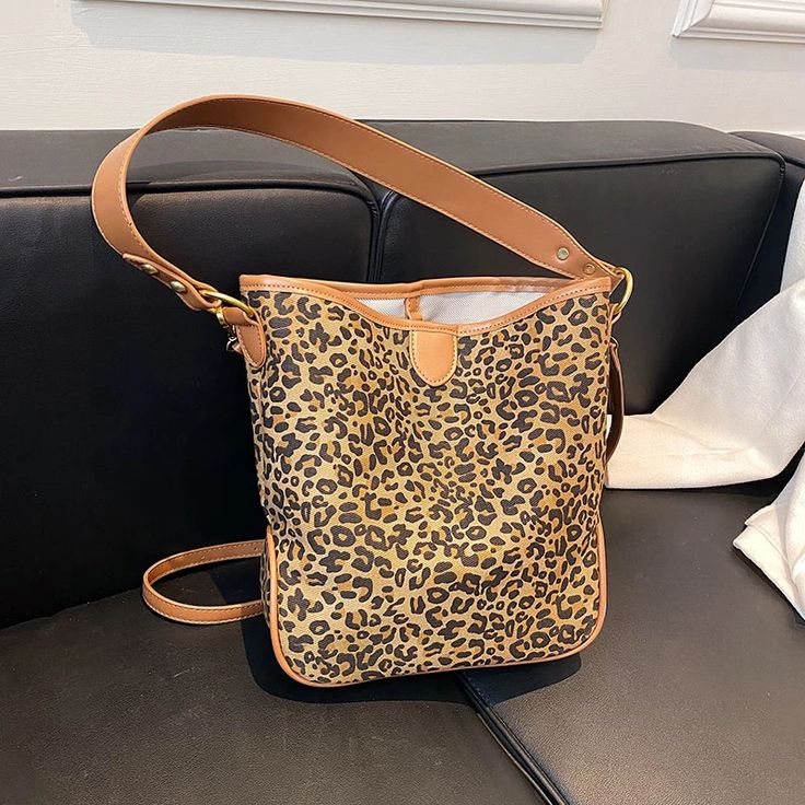 Garner Women's Leather Leopard Crossbody Handbag | Ultrasellershoes.com – Ultra Seller Shoes Trendy Large Capacity Bucket Phone Bag, Casual Phone Bag With Adjustable Strap, Summer Shoulder Bag For Errands With Mobile Phone Holder, Casual Rectangular Phone Bag With Removable Pouch, Casual Large Capacity Crossbody Phone Bag, Casual Summer Phone Bag With Removable Pouch, Casual Travel Phone Bag With Large Capacity, Casual Large Capacity Phone Bag For Travel, Casual Large Capacity Pouch Phone Bag