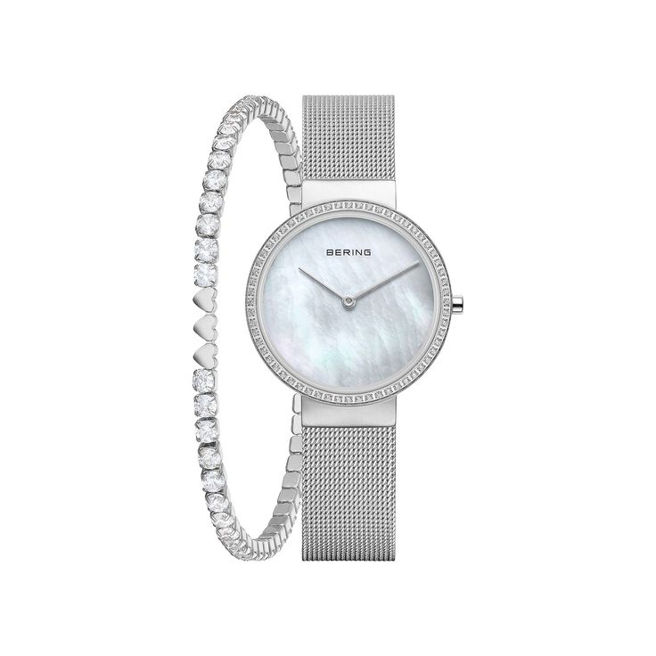 BERING's high-quality materials are used for the watches in the Classic collection, such as particularly hard, crystal-clear and scratch-resistant sapphire crystal. As a result, time leaves no traces on this watch glass. The skin-friendly stainless steel used guarantees a glamorous appearance. The cool look of the steel and the purist, clear line of the BERING watch design complement each other ideally. Classic elegance meets an unmistakably pleasant wearing experience and ensures the classicall White Gold Quartz Watches As Gift, White Metal Watch As Gift, White Metal Watch For Gift, White Gold Watch Accessories With Round Dial For Gifts, White Gold Stainless Steel Watch For Gift, White Gold Stainless Steel Watch As Gift, Gift White Gold Stainless Steel Watch, Gift Stainless Steel Watch Accessories With Diamond Hour Markers, White Gold Stainless Steel Watch Accessories For Gift